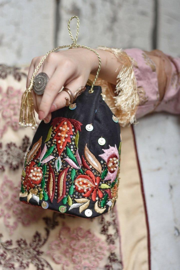 Chapter 13 - Black Potli Bag