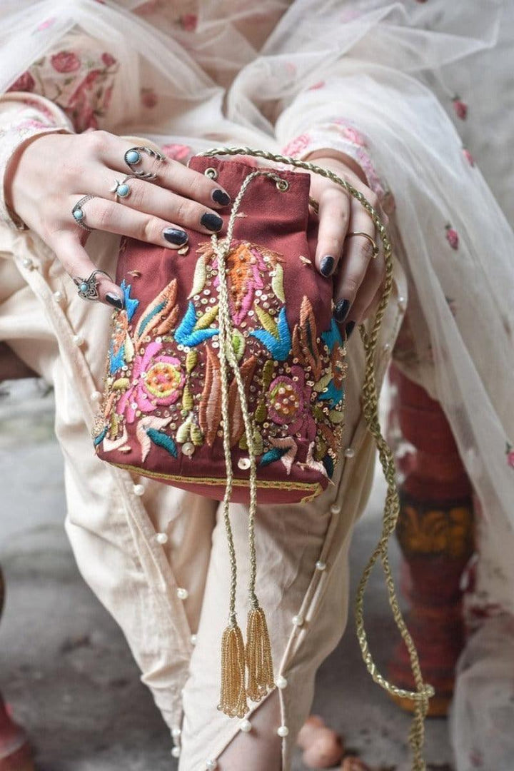 Chapter 13 - Red Potli Bag
